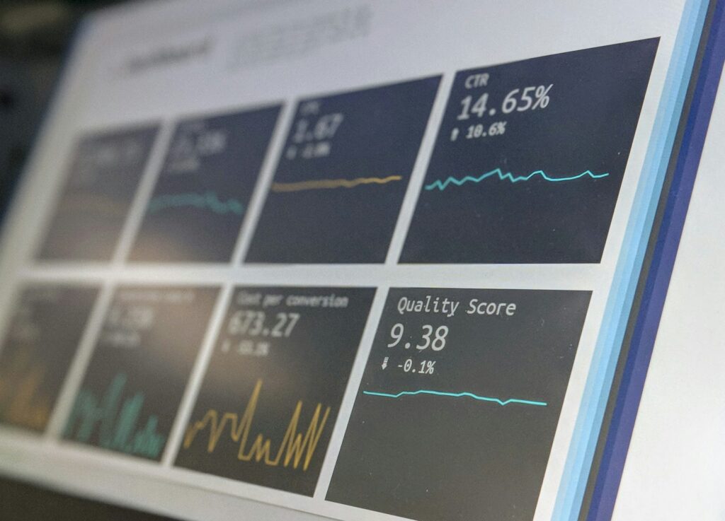 Data reporting dashboard displayed on a laptop screen, representing SOC alert triage and false-positive review